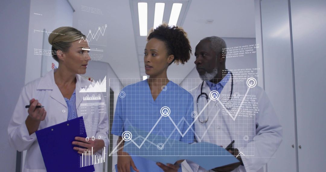 Medical team collaborating with holographic data analytics in hospital corridor