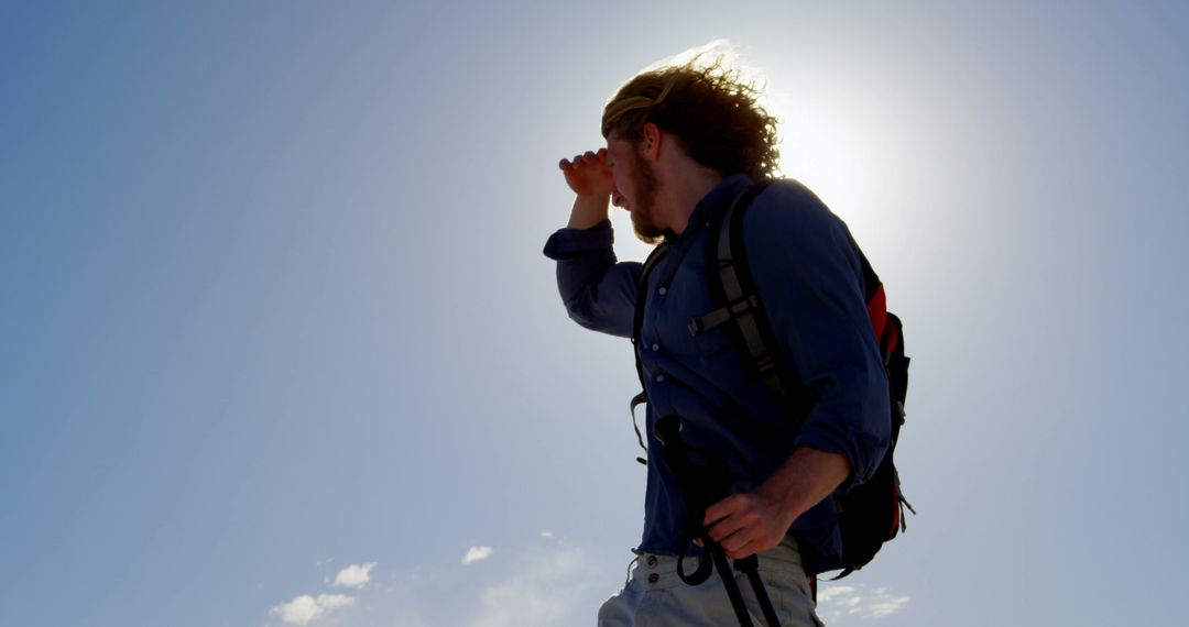 Adventurous Hiker Exploring Scenic Mountain Heights