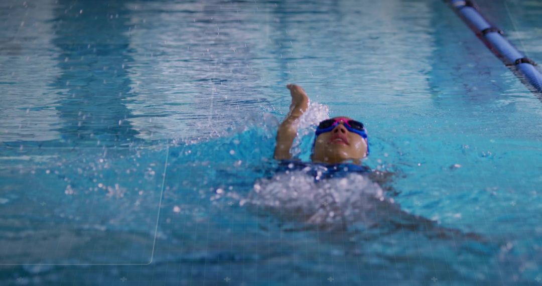 Swimmer Doing Backstroke in Pool with Determination