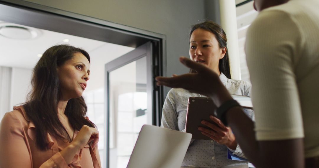 Collaborative Team Meeting in Modern Office Space