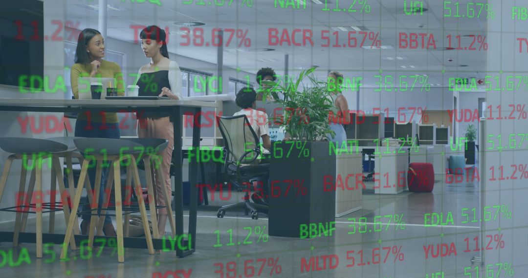 Diverse Business Team Analyzing Stock Market Data in Modern Office