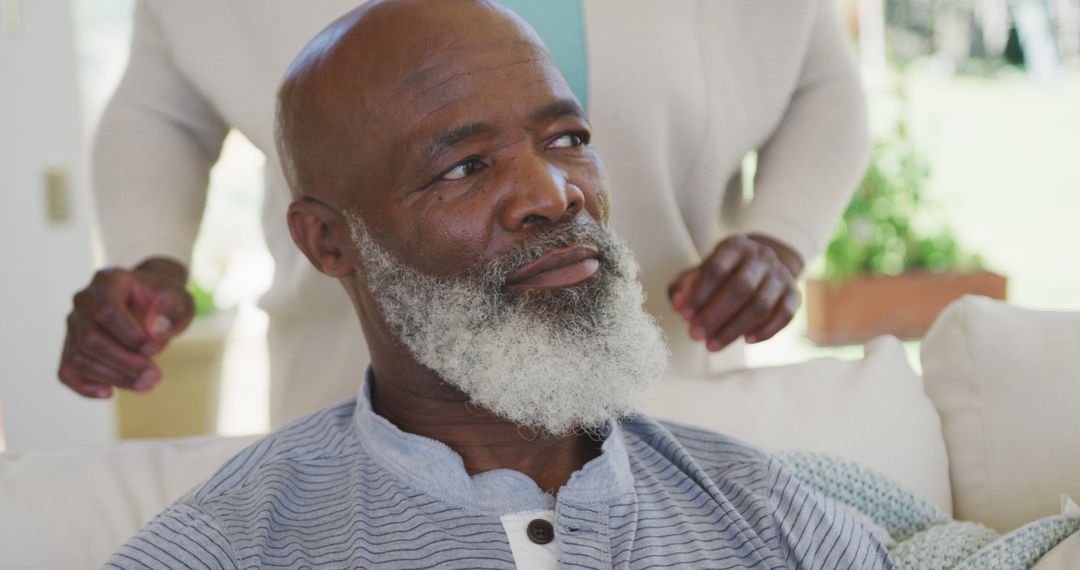 Elderly Man with White Beard Sitting Thoughtfully - Free Images, Stock Photos and Pictures on Pikwizard.com