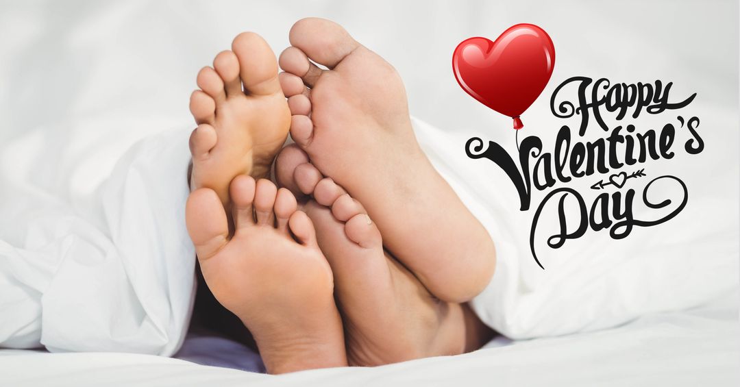 Valentine's Day Couples Feet Cozy Under Sheets