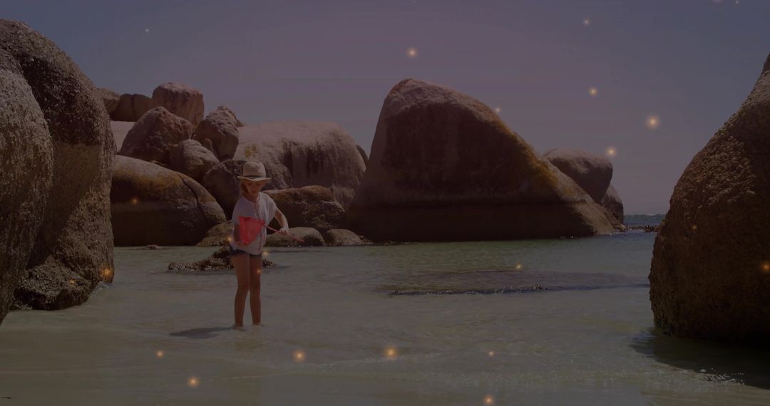 Child Explorers in Rocky Coastal Cove Sparkling Lights