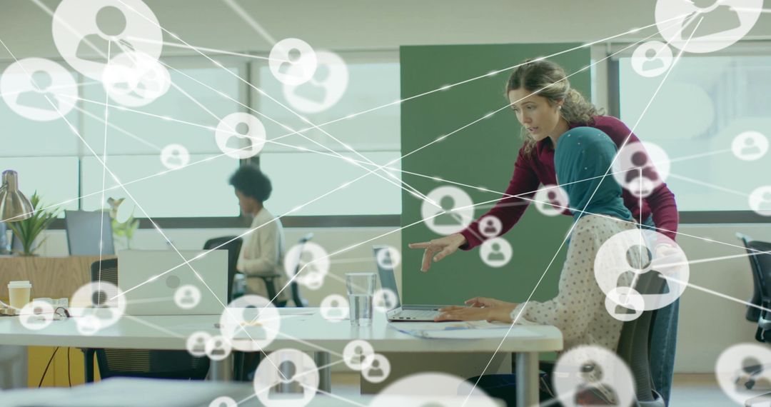 Diverse Team Collaborating in High-Tech Office Environment