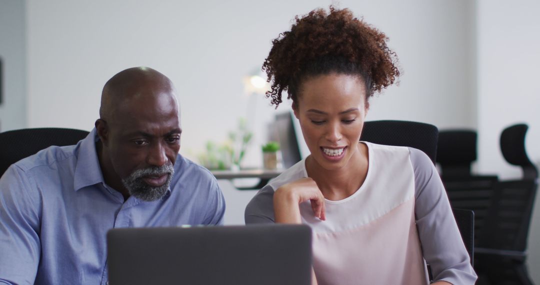 African American Business Professionals Collaborating on Laptop - Free Images, Stock Photos and Pictures on Pikwizard.com