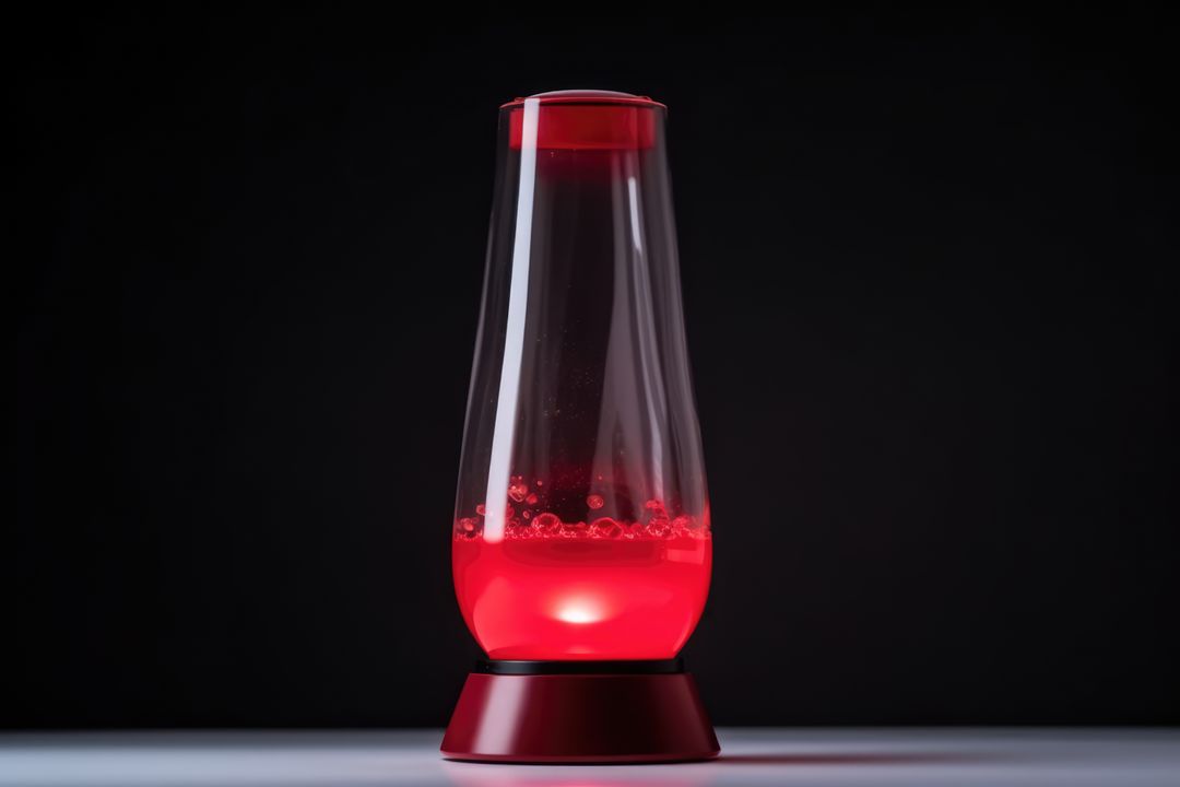 Red lava lamp on table in dark room at night, created using generative ai technology - Free Images, Stock Photos and Pictures on Pikwizard.com