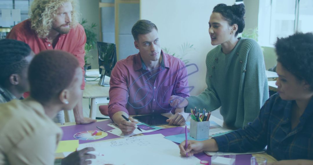 Diverse Group in Team Meeting Collaborating on Project