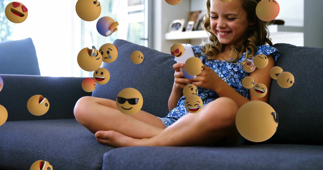 Joyful Girl Surrounded by 3D Emojis on Comfortable Home Sofa