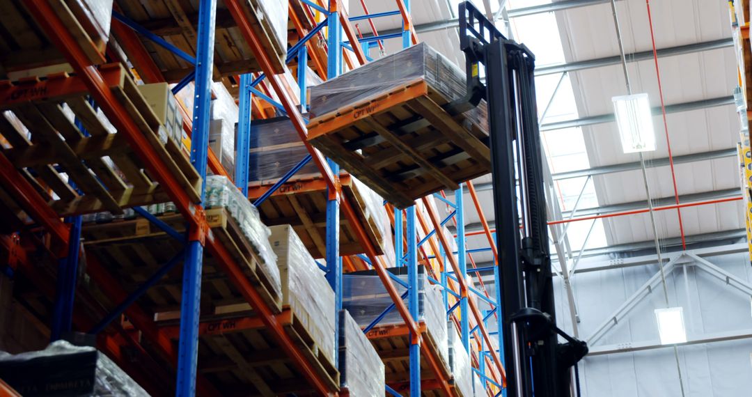 Forklift Moving Boxes on High Shelves in Warehouse - Free Images, Stock Photos and Pictures on Pikwizard.com