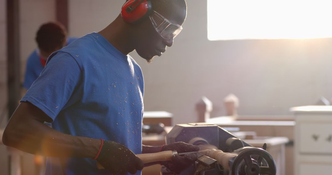 Craftsman Shaping Wood on Lathe with Precision