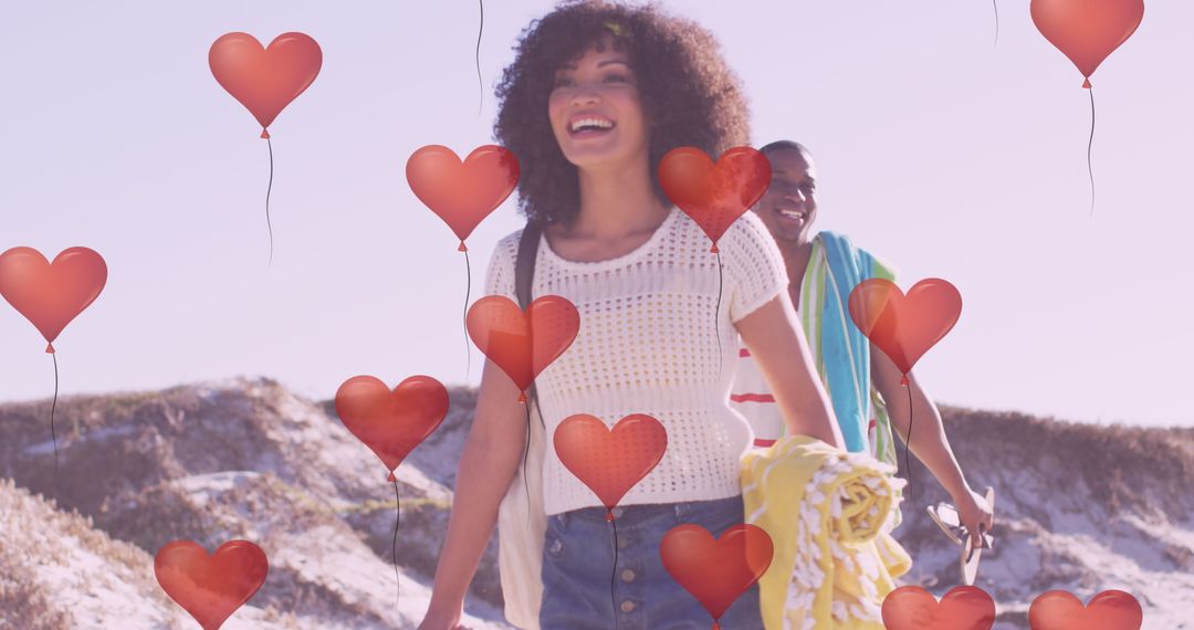 Joyful Couple at Beach with Floating Hearts