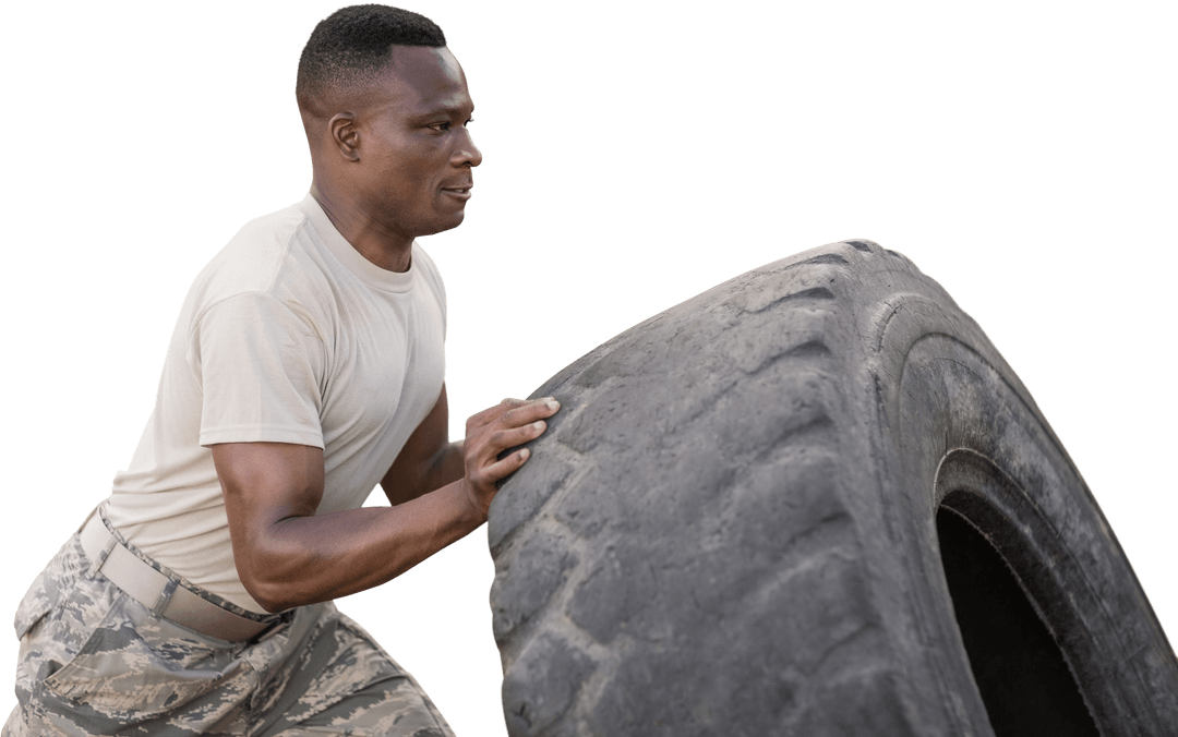 Military Soldier in Uniform Flipping Large Tire Transparent Background