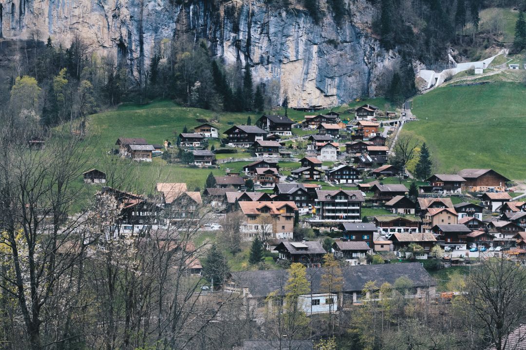 Quaint Swiss Alpine Village Nestled in Scenic Mountain Valley - Free Images, Stock Photos and Pictures on Pikwizard.com