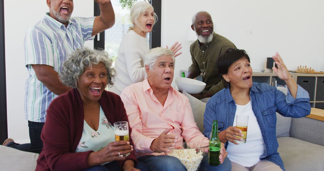 Group of Senior Friends Enjoying Watching Sports Game at Home - Free Images, Stock Photos and Pictures on Pikwizard.com