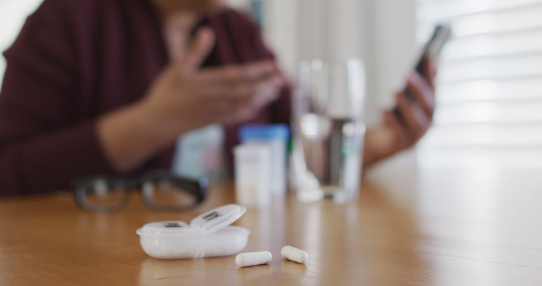 Person Checking Medication Instructions on Smartphone - Free Images, Stock Photos and Pictures on Pikwizard.com