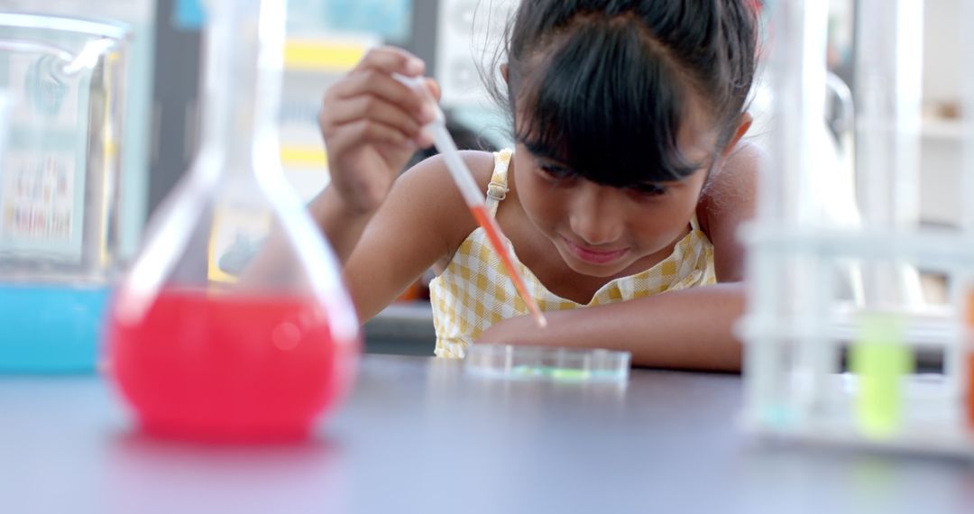 Curious Young Student Conducting Science Experiment in Classroom