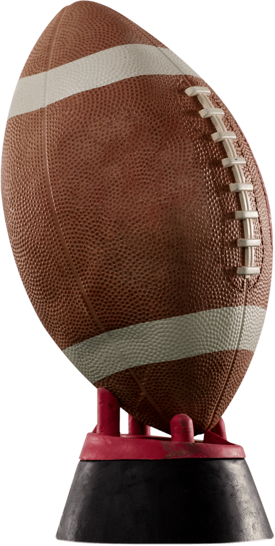 Close up of Transparent American Football on Kickoff Tee