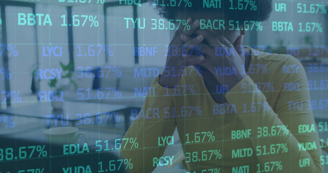 Frustrated Professional Analyzing Trading Data on Laptop