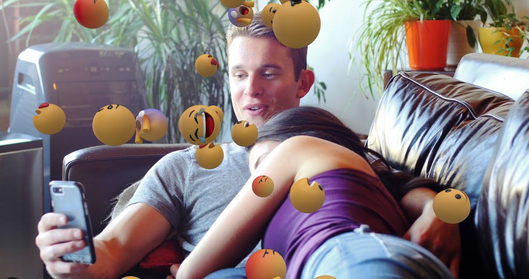 Couple Embracing Social Media Enjoyment on Couch