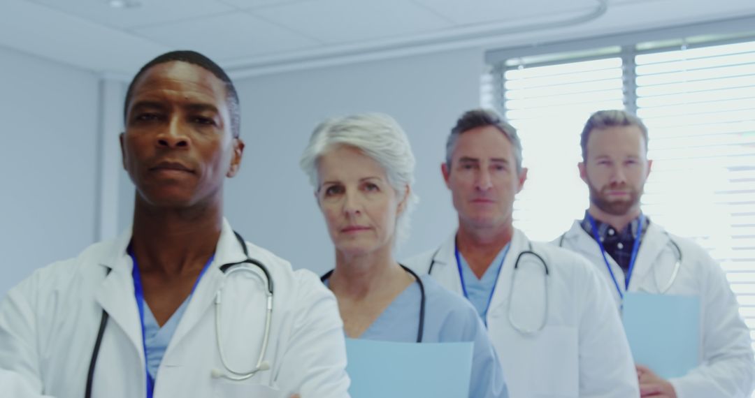 Diverse Team of Confident Medical Professionals Standing in Hospital - Free Images, Stock Photos and Pictures on Pikwizard.com