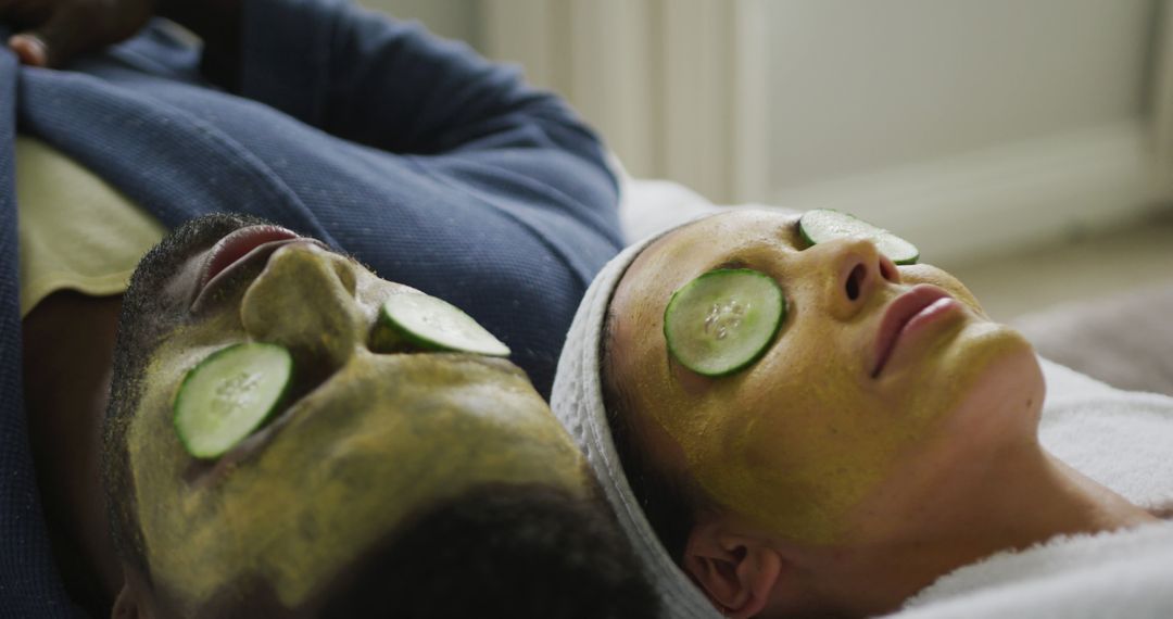 Couple Relaxing with Cucumber Masks in Home Spa - Free Images, Stock Photos and Pictures on Pikwizard.com