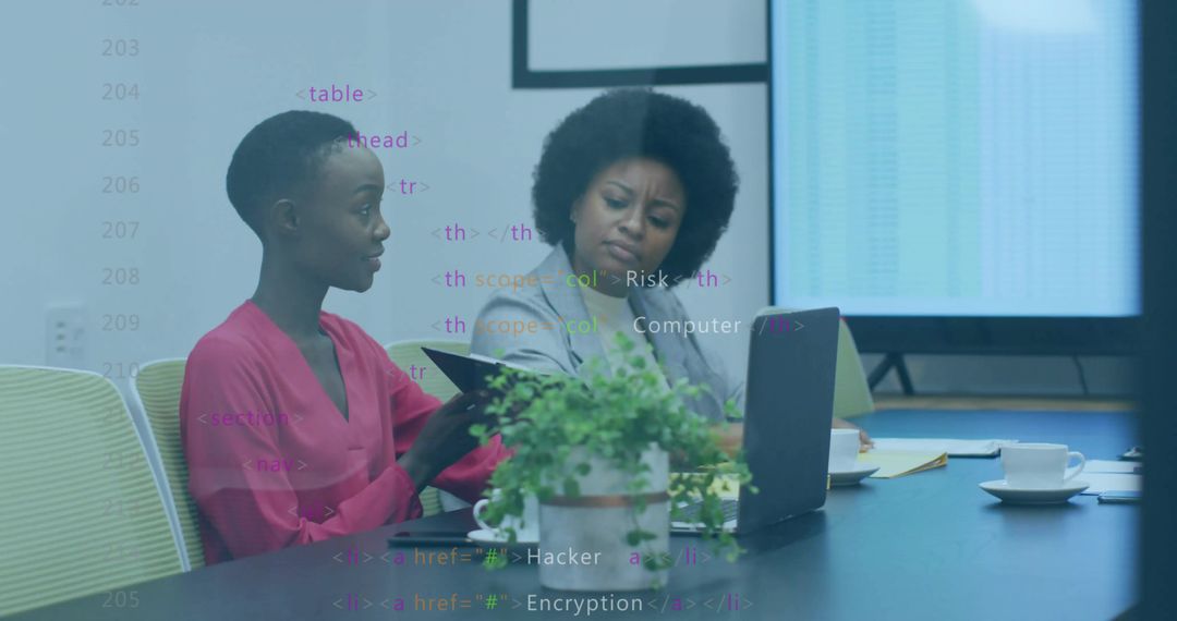 Business Colleagues Analyzing Digital Data in Modern Office Meeting