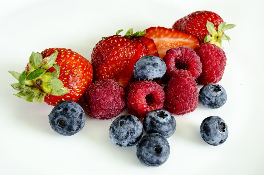 Fresh Mixed Berries on White Background - Free Images, Stock Photos and Pictures on Pikwizard.com
