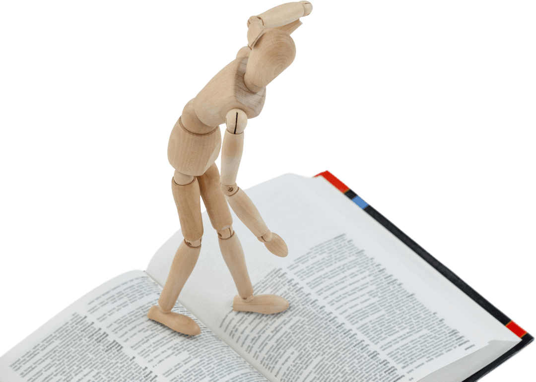 Wooden Figurine Standing on Open Book with Transparent Background