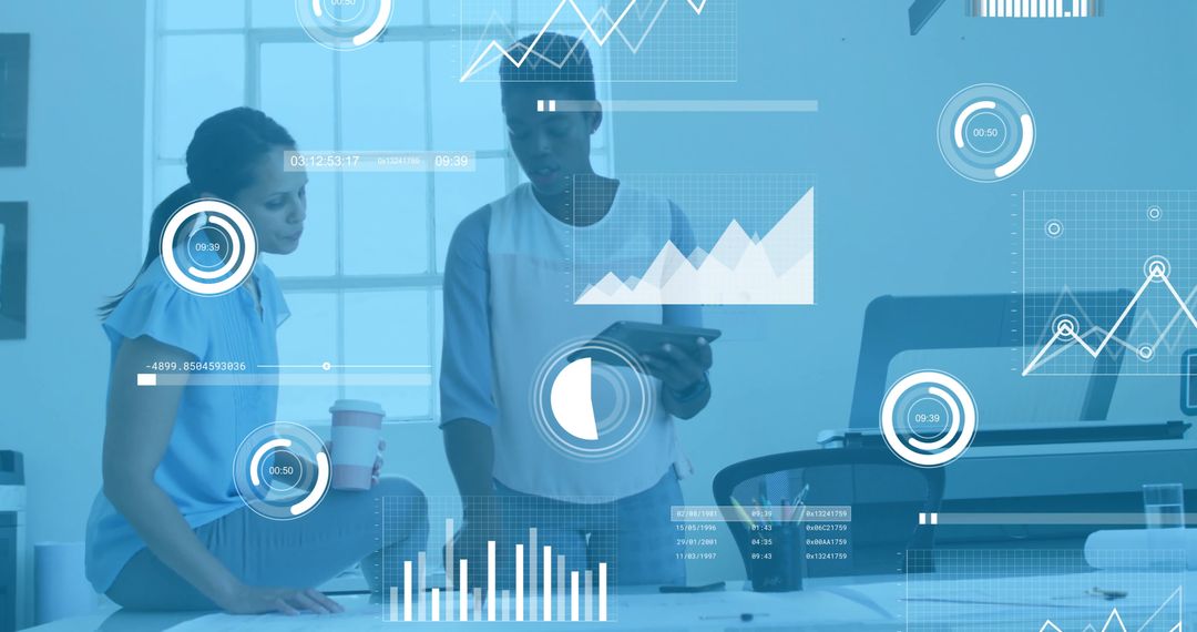 Diverse Colleagues Analyzing Financial Data with Digital Interface