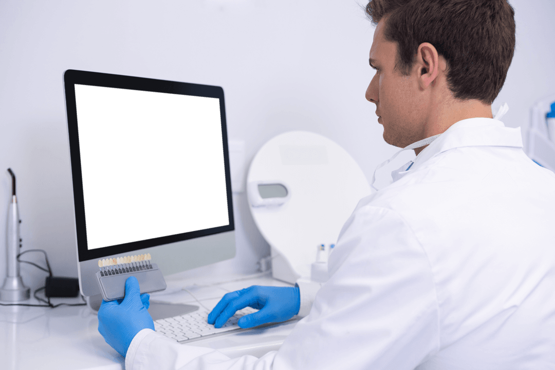 Dentist Working on Computer with Transparent Screen in Modern Clinic