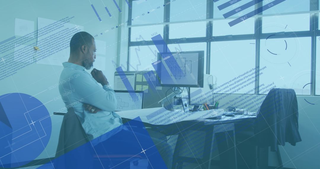 Thoughtful Analyst Working with Digital Data in Office