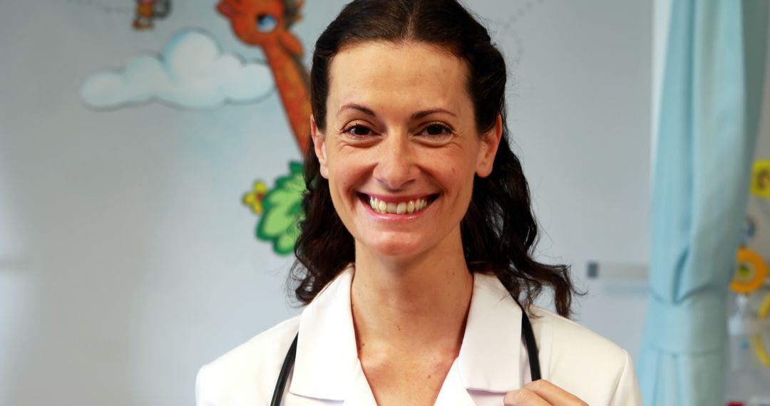 Smiling Female Doctor in Pediatric Office with Stethoscope - Free Images, Stock Photos and Pictures on Pikwizard.com