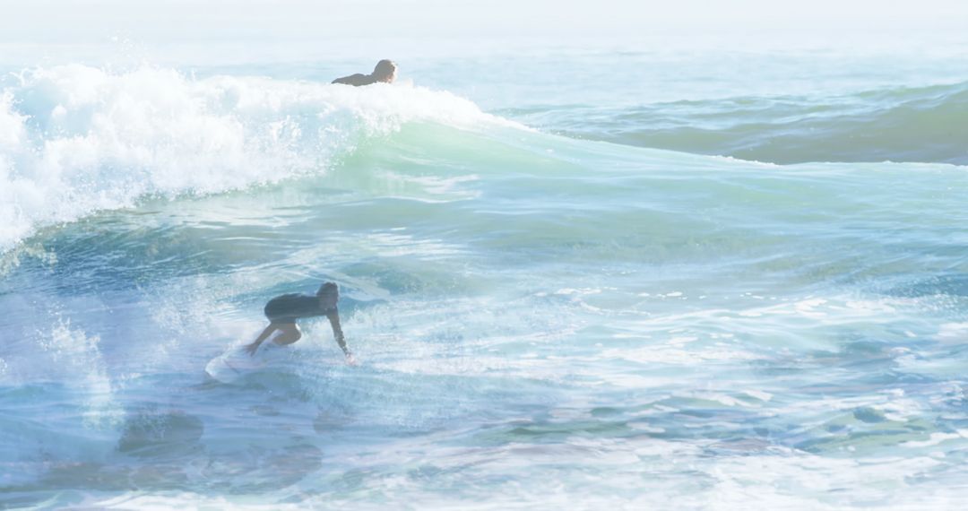 Double Exposure of Surfer Riding Ocean Waves