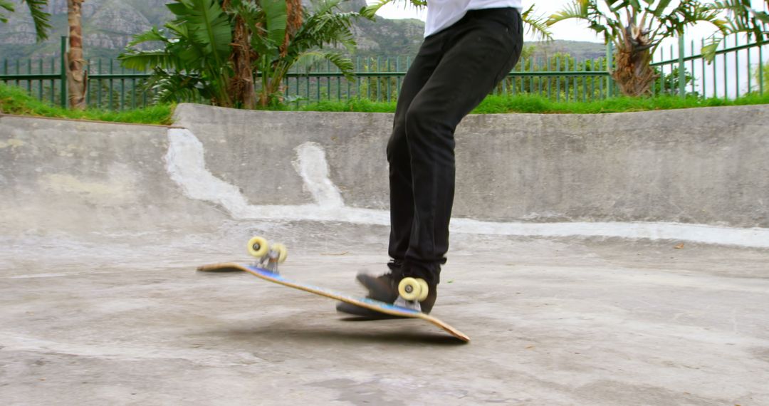 Skateboarder Practicing Tricks at Urban Skatepark - Free Images, Stock Photos and Pictures on Pikwizard.com