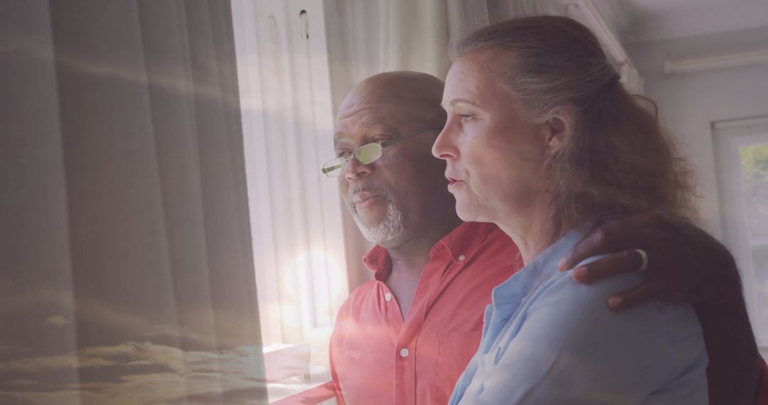 Senior Couple Enjoying Serene Home Atmosphere with Intimate Reflection