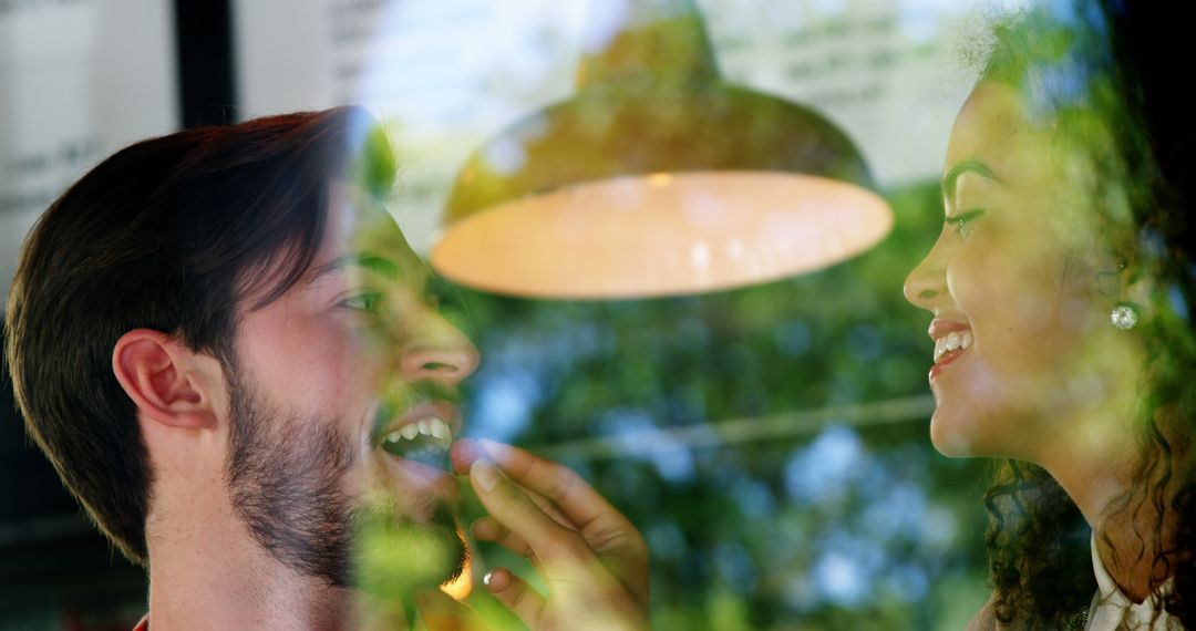 Diverse Friends Sharing Laughter at Cafe