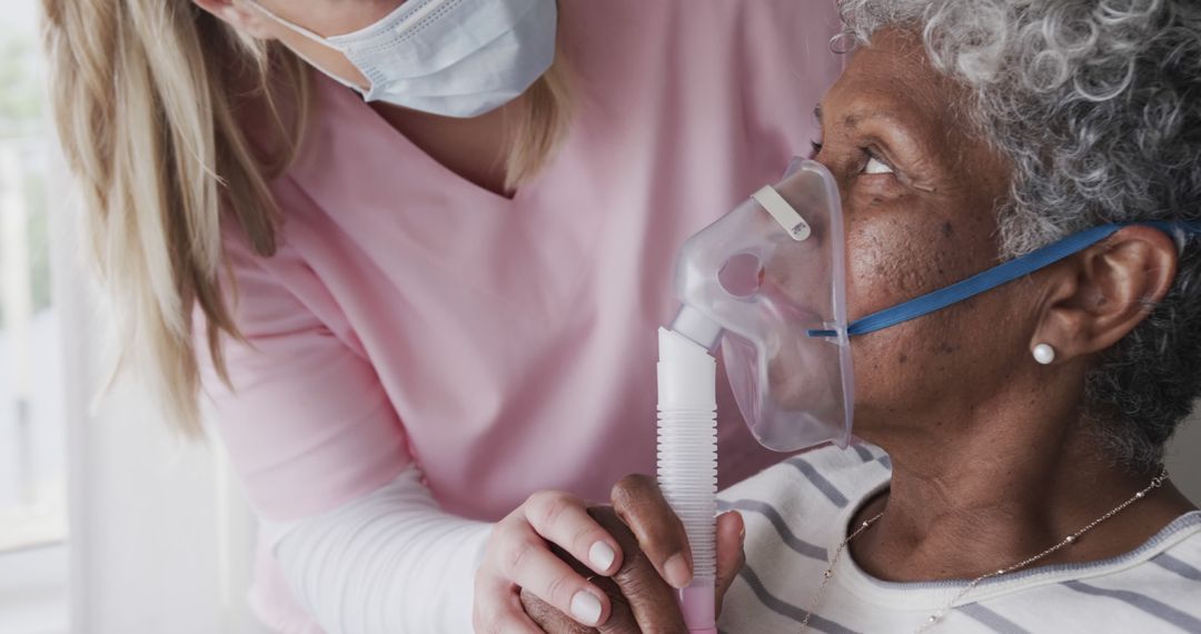 Nurse Assisting Elderly Woman with Oxygen Mask - Free Images, Stock Photos and Pictures on Pikwizard.com