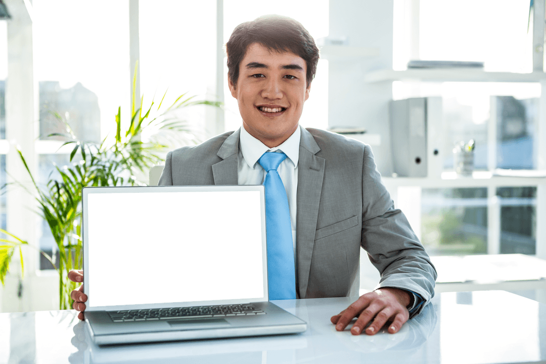 Transparent Laptop Display with Smiling Businessman