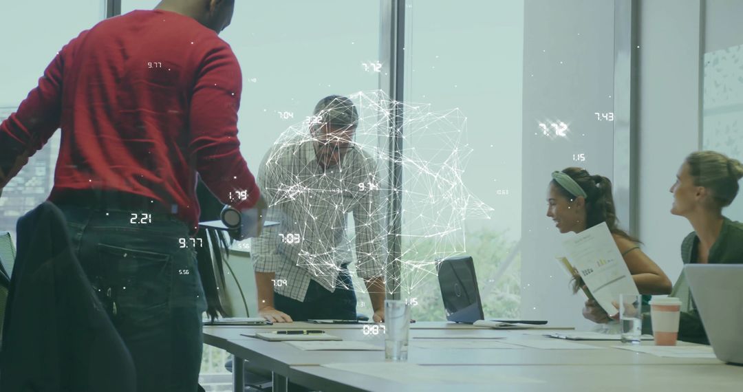 Creative Team Discussing Digital Network in Modern Office