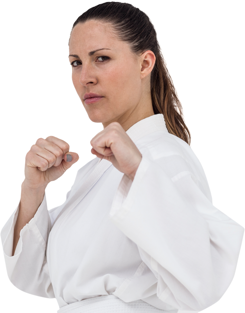 Confident Woman Executing Fierce Karate Fighting Stance - Download Free Stock Images Pikwizard.com