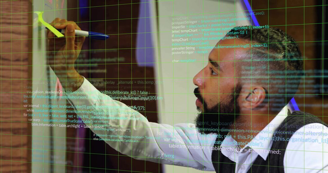 Man Coding on Glass Board in Bright Innovative Office Setting