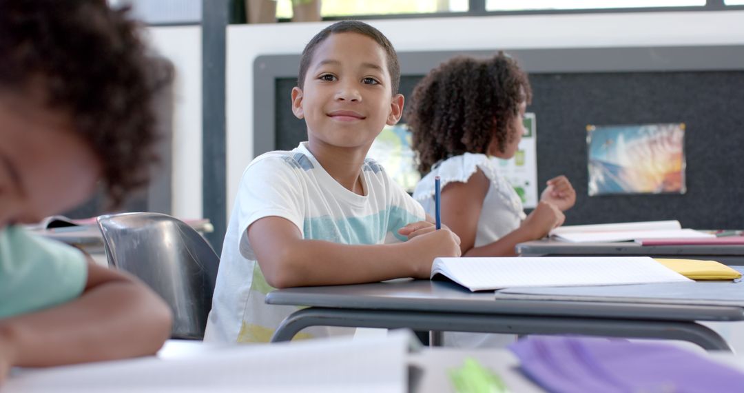 Friendly Young Student in Classroom Setting for Learning