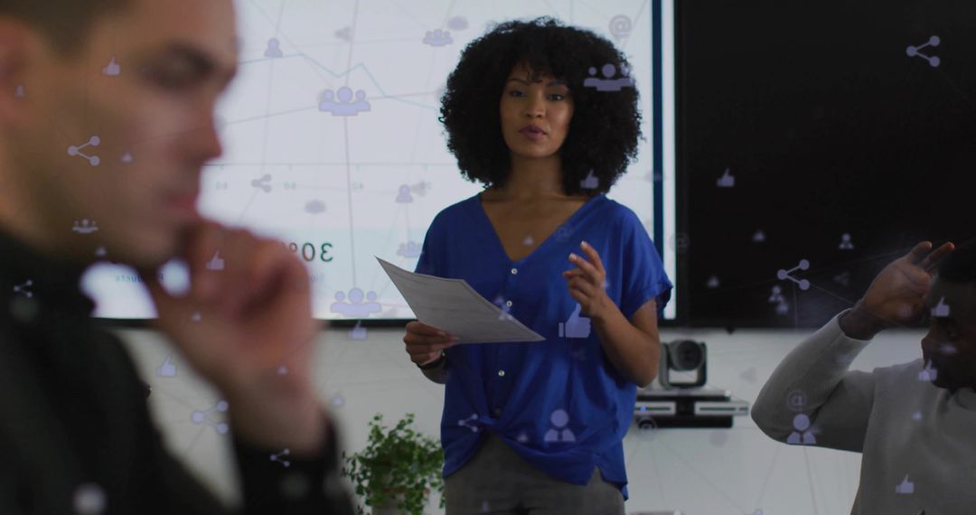Professional Woman Revealing Network Insights in Modern Meeting Room