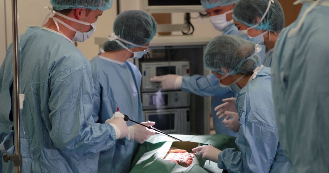 Surgeons Performing Live Surgery in Operating Room - Free Images, Stock Photos and Pictures on Pikwizard.com