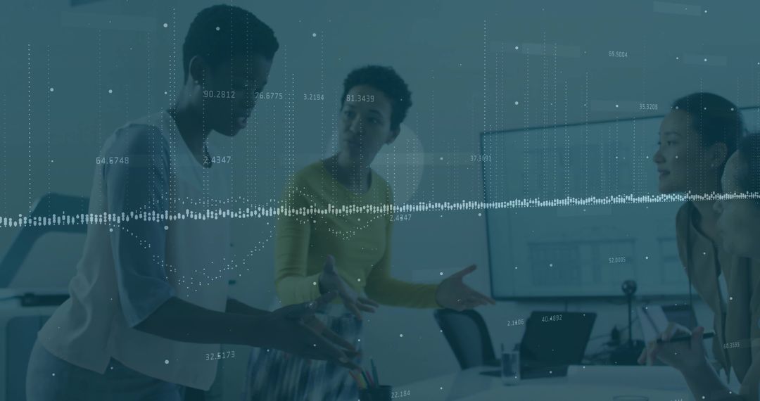 Women Collaborating on Data Visualization in Modern Office Setting