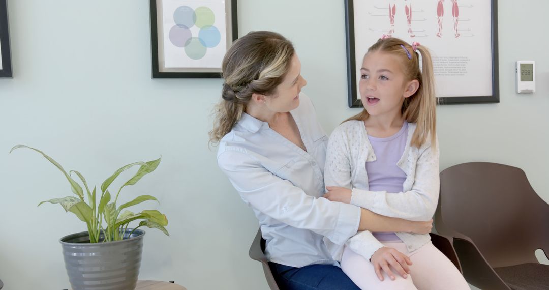 Mother Comforting Daughter in Medical Waiting Room - Free Images, Stock Photos and Pictures on Pikwizard.com