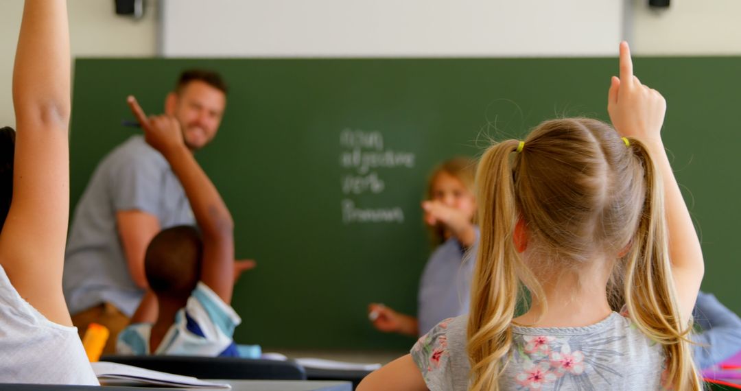 Engaged Students Raising Hands in Interactive Classroom Participation