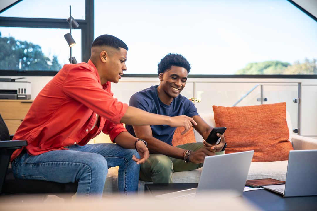 Teamwork Inspiration in Office Lounge with Technology