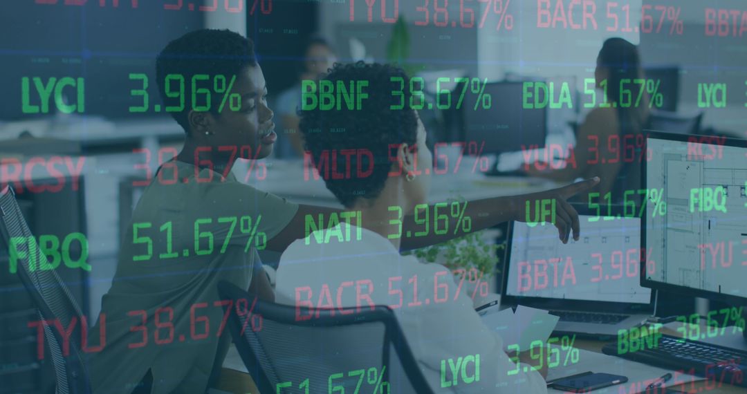 Diverse Team Analyzing Stock Market Data on Screens